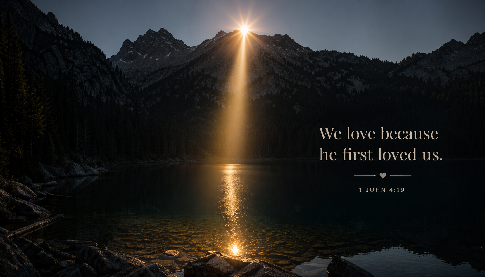 1 John 4:19 Bible verse wallpaper - We love because he first loved us - single beam of light on dark mountain lake with snow-capped peaks
